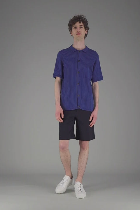Blue knitted polo shirt