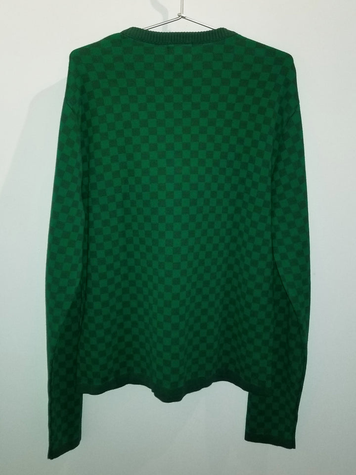 Knitted sweater in organic cotton with green checkerboard